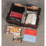 A box of stamps including the Channel Islands, Wedgwood and a selection of pre-decimal stamp