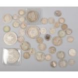 A quantity of pre 1920s silver coins. Including half crowns, etc. 120g.