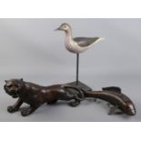 A bronze figure of a tiger along with a similar fish and wooden painted duck.