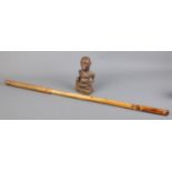 A Luba Hemba Congo style wooden carved figure along with a tribal staff.