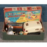 A box of assorted toys and games, to include 'Give A Show' projector and diecast vehicles.