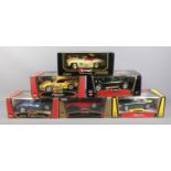 Six boxed 1:18 scale Burago vehicles, to include Gold Collection Porsche 911, BMW M Roadster and