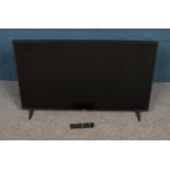 An LG Model 43UJ630V 43" Smart TV with remote. In full working order.