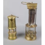 A Brass Lamp and Limelight Company Mining Lamp along with a Stephenson style safety lamp. Smallest