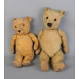 A pair of vintage teddy bears. Approx. 41cm and 51cm tall.