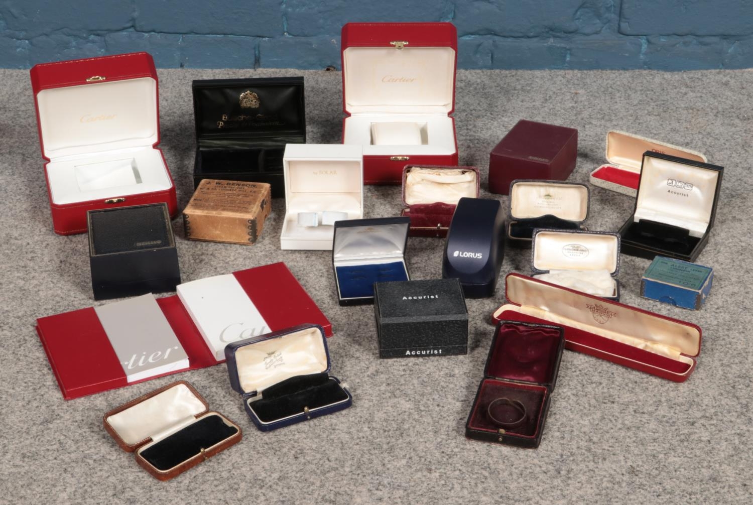 A large quantity of empty watch boxes, to include examples from Cartier, Bueche-Girod, Benson,