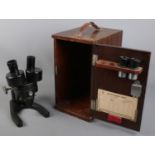 A Watson Barnet cased microscope.