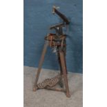 A Hobbies treadle operated saw. 90 cm in height.