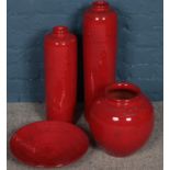 Four large decorative red ground ceramics. Including two slender vases, bowl, etc.