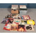 Two boxes of mostly LP records. Including The Police, Neil Diamond, Phil Collins, Frank Sinatra,