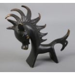 A Walter Bosse style bronze figure formed as a stylised horse. (10cm)