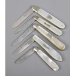 Five silver bladed and mother of pearl folding fruit knives. All assayed for Sheffield, 1911, by