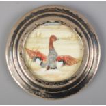 A silver miniature photo frame housing a watercolour of a duck. Assayed for London. Date and