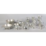 A large collection of pewter metalwares. To include quaich, miniature tankards, three piece tea