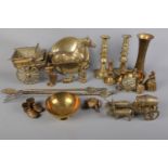 A quantity of Brassware. A book stand, candlestick holders, fire accessories, miniature Davy lamp,