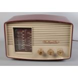 A vintage His Master Voice valve radio.