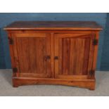 A stained pine sideboard. H90 x L120 x W47cm