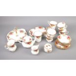 A Royal Albert Old Country Roses tea set. To include tea pot and cake stand. Approx. 28 pieces.