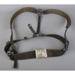A pair of German WWII shoulder braces with belt buckle.