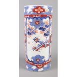 An antique Japanese Imari cylindrical vase. 30.5cm. Repaired.
