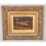 A 19th century gilt framed oil on panel, interior of a barn with sheep. Signed JH, possibly Joseph