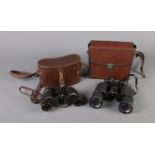 Two pairs of binoculars in leather cases to include Tasco Zip 160Z and Ross Steptron 8x30.