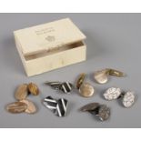 Four pairs of gents cufflinks. Includes two silver pairs.