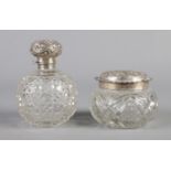 Two late Victorian silver topped dressing table items, to include scent bottle complete with glass