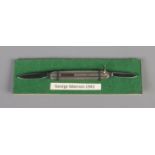 A Silver scaled penknife by George Ibberson. Hallmarked Sheffield 1943. Length of handle 6.5cm.