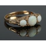 A vintage 9ct gold and three stone opal ring. Size P 1/2. 3.76g.