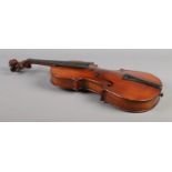 An early 20th century two piece back violin. Labelled The School Violin, Rushworth & Dreaper. 13.