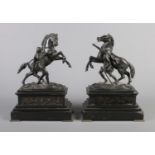 Graux Marly Foundry, a pair of bronze Marly Horses raised on slate plinths. Signed. 32cm. Bronzes
