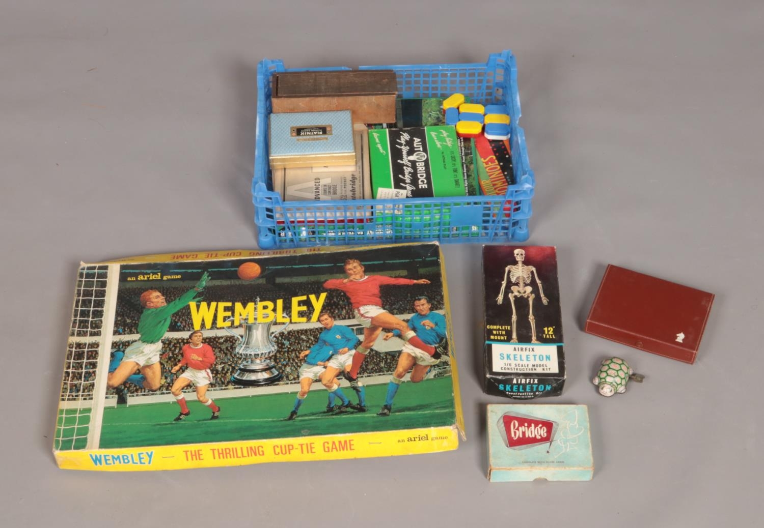 A box of vintage toys and games including travel chess set, auto-bridge, dominoes and boxed Game