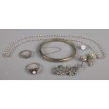 A small collection of silver jewellery. Including bangle, marcasite examples, rings, etc.