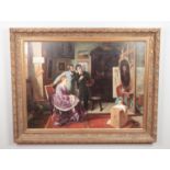 A large gilt framed oil on canvas, interior scene with a painter painting a portrait. Signed F