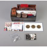 A quantity of assorted coins mainly commemorative sets including Royal British Legion sets and