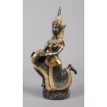 A cast bronze sculpture formed as a Thai musician, with gilt decoration. 19cm.