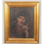 A 19th century gilt framed oil on canvas, portrait of a fisherman smoking a pipe, signed J Fisher,