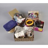 A large box of costume jewellery including necklaces, rings, earrings and cufflinks.