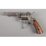 A late 19th/early 20th century Belgian pinfire revolver with hammer action.