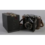 A Zeiss Ikon Derval camera in original case along with a Kodak No. 2 Brownie.