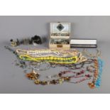 A quantity of costume jewellery including bracelets, bangles and beads etc.