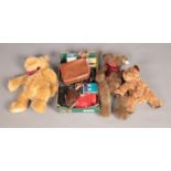 A box of miscellaneous including trio of large teddy bears and assorted camera equipment.