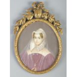 A gilt framed portrait miniature depicting a maiden, painted on card. 10.5cm x 9cm.