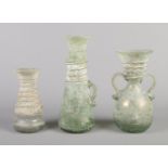 Three blown glass vases with applied trailing decoration. Tallest 24.5cm.