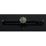 A 9ct Gold and Diamond cluster bar brooch, with central diamond â…›ct. Total weight: 2.89g