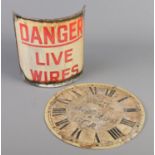 An enamel post sign 'Danger Live Wires' along with a GCR clock dial. Dial diameter 30cm.