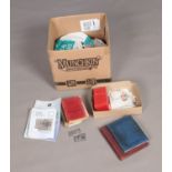 A box of British stamps including two Stanley Gibbons albums, a large quantity of loose stamps and