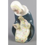 A Lenci pottery figure of the Madonna. Modelled kneeling with raised hands, marked 'Lenci Made in