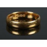 A 22ct Gold wedding band, assayed for Birmingham. Size M. Total weight: 3.95g